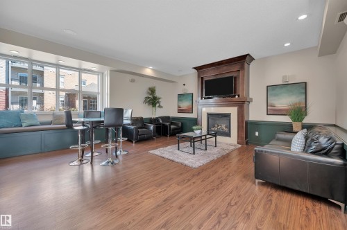 122 655 Watt Boulevard, Edmonton, AB - Indoor Photo Showing Living Room With Fireplace