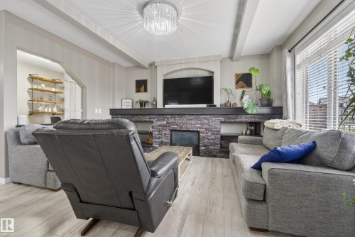 2110 53 Street, Edmonton, AB - Indoor Photo Showing Living Room With Fireplace