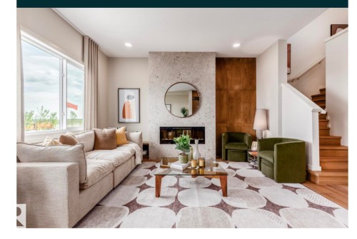 179 Stiles Bend, Leduc, AB - Indoor Photo Showing Living Room With Fireplace