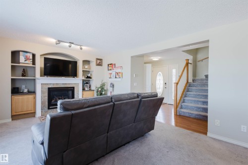 3534 Mclean Crescent, Edmonton, AB - Indoor Photo Showing Living Room With Fireplace