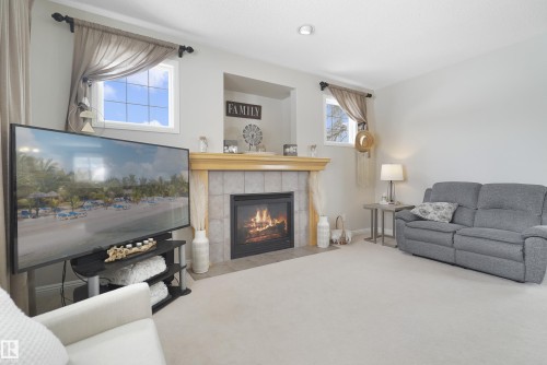 103 Griesbach Road, Edmonton, AB - Indoor Photo Showing Living Room With Fireplace