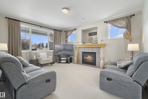 103 Griesbach Road, Edmonton, AB - Indoor Photo Showing Living Room With Fireplace