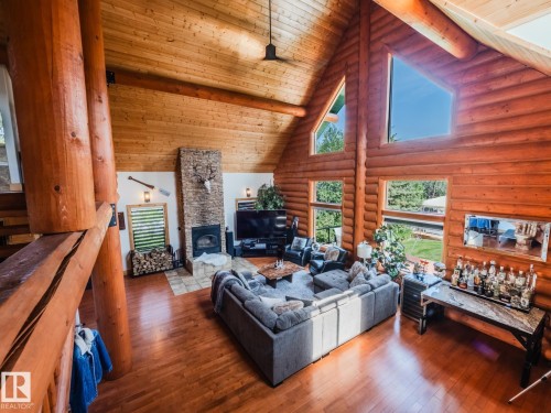 213 Lakeshore Drive, Rural Athabasca County, AB - Indoor Photo Showing Living Room With Fireplace