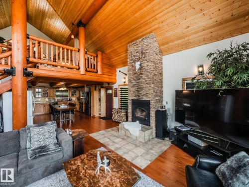 213 Lakeshore Drive, Rural Athabasca County, AB - Indoor Photo Showing Living Room With Fireplace