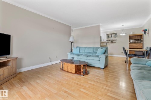 308 10520 80 Avenue, Edmonton, AB - Indoor Photo Showing Living Room