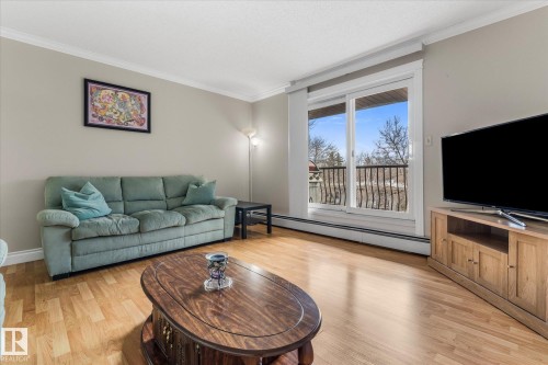 308 10520 80 Avenue, Edmonton, AB - Indoor Photo Showing Living Room