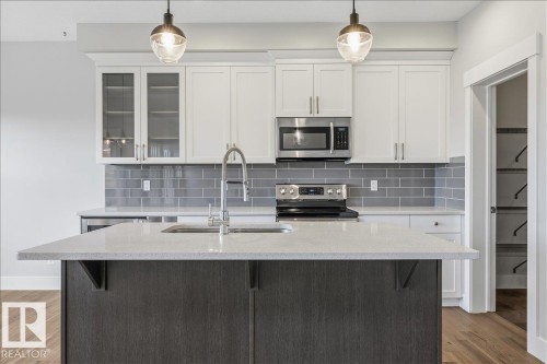 88 Tribute Common, Spruce Grove, AB - Indoor Photo Showing Kitchen With Upgraded Kitchen