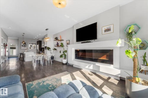 21 Kenton Way, Spruce Grove, AB - Indoor Photo Showing Living Room With Fireplace