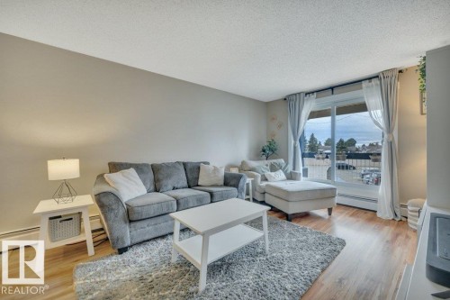 204 2620 Mill Woods Road E, Edmonton, AB - Indoor Photo Showing Living Room