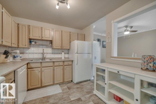 204 2620 Mill Woods Road E, Edmonton, AB - Indoor Photo Showing Kitchen With Double Sink