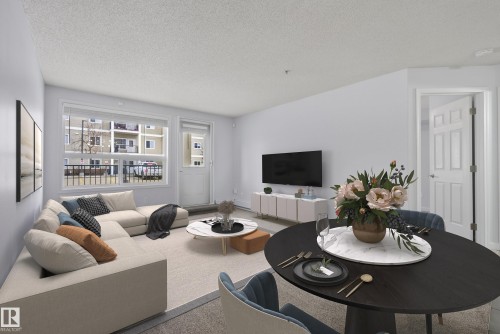 #113 13625 34 St Nw, Edmonton, AB - Indoor Photo Showing Living Room