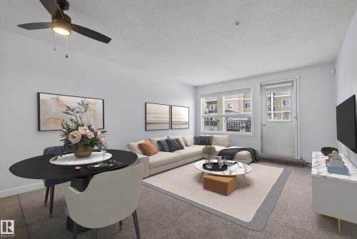 #113 13625 34 St Nw, Edmonton, AB - Indoor Photo Showing Living Room