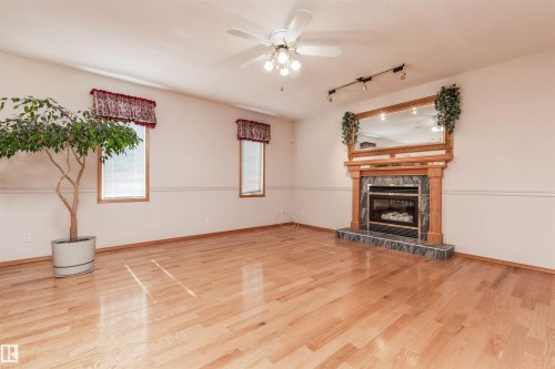 5735 161 Avenue, Edmonton, AB - Indoor Photo Showing Living Room With Fireplace