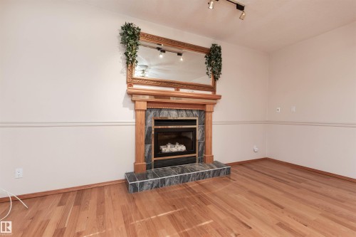 5735 161 Avenue, Edmonton, AB - Indoor Photo Showing Other Room With Fireplace