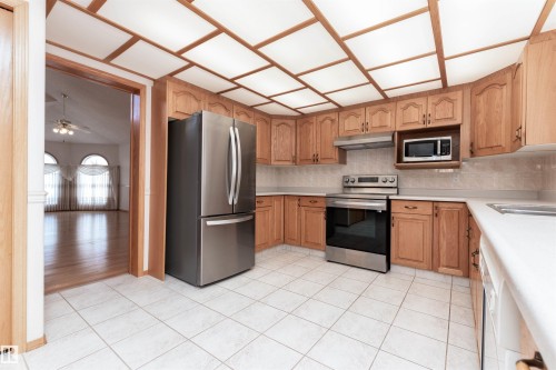 5735 161 Avenue, Edmonton, AB - Indoor Photo Showing Kitchen With Double Sink