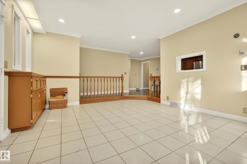 Light-toned tile flooring throughout an open concept area - 33 Glen Meadow Crescent, St. Albert, AB - Indoor Photo Showing Other Room