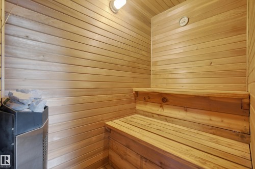 Dedicated sauna featuring wood-paneled walls and tiered wooden benches - 33 Glen Meadow Crescent, St. Albert, AB - Indoor Photo Showing Other Room