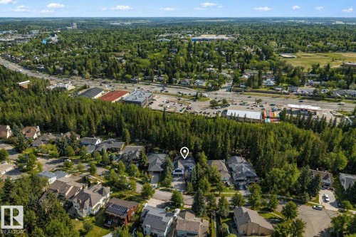 Aerial perspective showcasing a residential street with mature trees - 33 Glen Meadow Crescent, St. Albert, AB - Outdoor With View