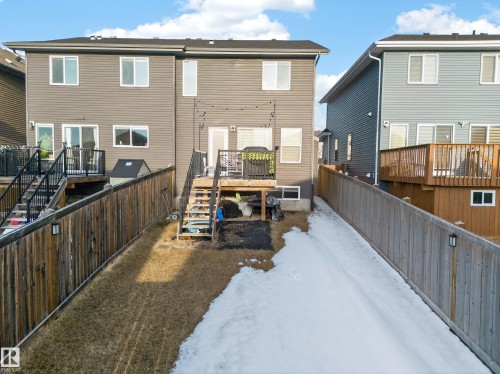 The property features a private fenced yard with a deck - 2118 52A Street, Edmonton, AB - Outdoor With Deck Patio Veranda With Exterior