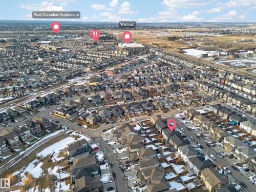 Aerial view of the surrounding residential neighborhood, featuring a variety of properties with sloped roofs - 2118 52A Street, Edmonton, AB - Outdoor With View