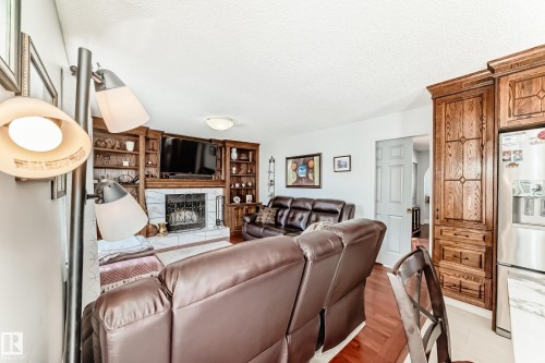 84 Jefferson Road, Edmonton, AB - Indoor Photo Showing Living Room With Fireplace