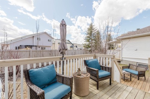 Spacious wood-plank deck with a light-toned railing system - 19 1659 Jamha Road, Edmonton, AB - Outdoor With Deck Patio Veranda With Exterior