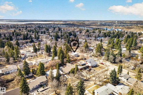 Aerial perspective showcasing a residential area with mature trees and established properties - 1 Greenwich Crescent, St. Albert, AB - Outdoor With View
