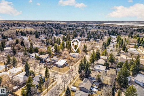 Aerial perspective showcasing a residential neighborhood surrounded by extensive tree coverage - 1 Greenwich Crescent, St. Albert, AB - Outdoor With View