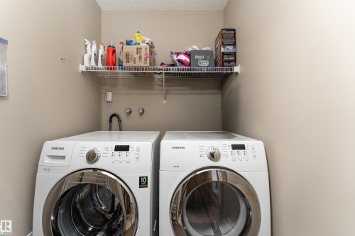 Laundry room featuring independent washer and dryer - 10906 72 Avenue, Edmonton, AB - Indoor Photo Showing Laundry Room