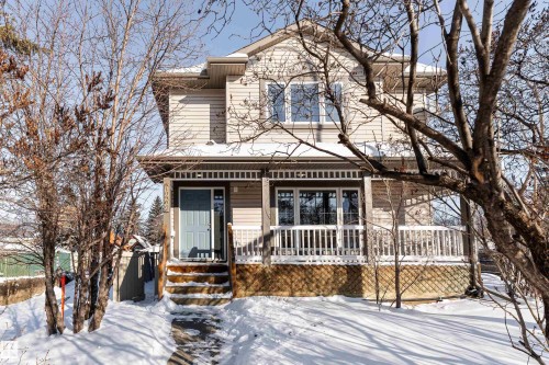 View of front of property featuring covered porch - 10906 72 Avenue, Edmonton, AB - Outdoor With Deck Patio Veranda