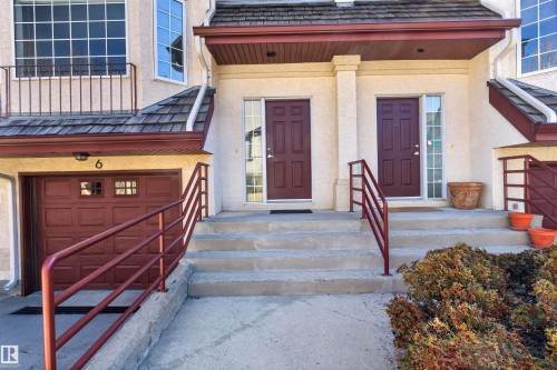 Exterior stucco finish with a shingle roofline - 6 1237 Carter Crest Road, Edmonton, AB 