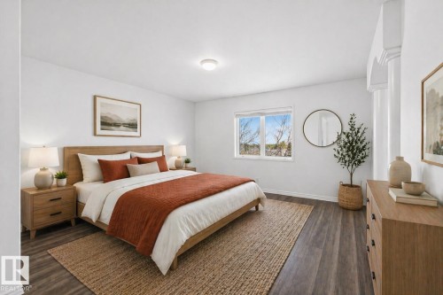 Bedroom featuring wood-finish flooring, a contemporary window, and recessed ceiling lighting - 6 1237 Carter Crest Road, Edmonton, AB 