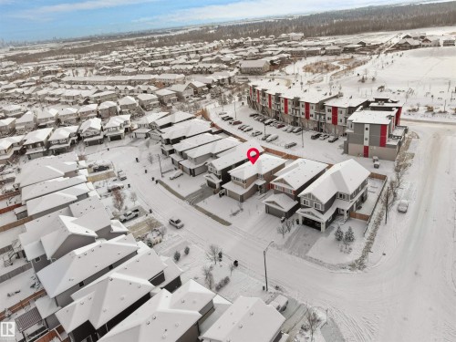 Contemporary residential area featuring a mix of detached and multi-unit properties - 20827 130 Avenue Nw, Edmonton, AB - Outdoor With View