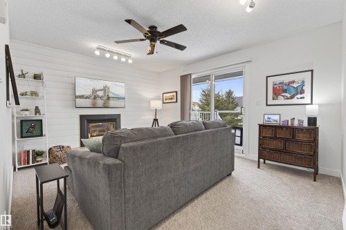 603 Beach Avenue, Cold Lake, AB - Indoor Photo Showing Living Room With Fireplace