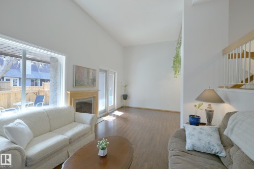 15 Glaewyn Es, St. Albert, AB - Indoor Photo Showing Living Room With Fireplace