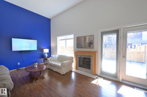 15 Glaewyn Es, St. Albert, AB - Indoor Photo Showing Living Room With Fireplace