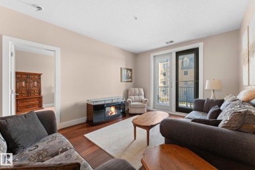 251 6079 Maynard Way, Edmonton, AB - Indoor Photo Showing Living Room