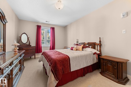 251 6079 Maynard Way, Edmonton, AB - Indoor Photo Showing Bedroom