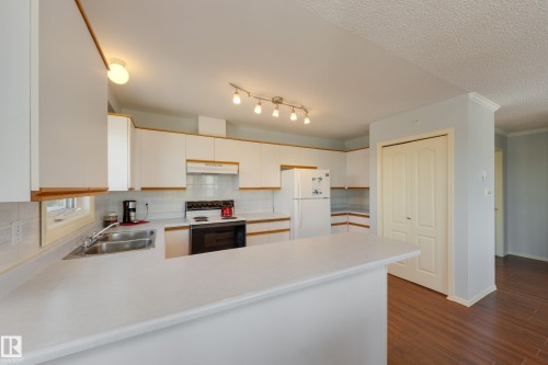 402 10610 76 Street, Edmonton, AB - Indoor Photo Showing Kitchen With Double Sink