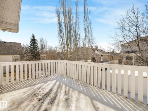 Outdoor deck space with white picket railing - 1054 Ormsby Crescent, Edmonton, AB - Outdoor
