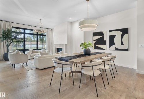 10534 139 Street, Edmonton, AB - Indoor Photo Showing Dining Room With Fireplace