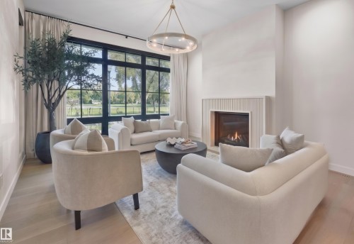 10534 139 Street, Edmonton, AB - Indoor Photo Showing Living Room With Fireplace