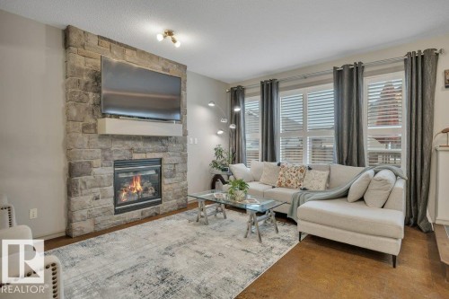 1611 63 Street, Edmonton, AB - Indoor Photo Showing Living Room With Fireplace