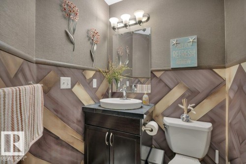 2-piece on main floor - 1611 63 Street, Edmonton, AB - Indoor Photo Showing Bathroom