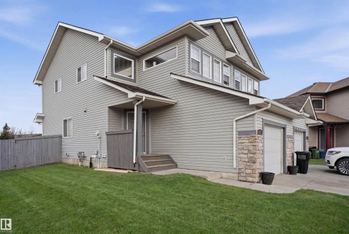 Modern two-story residence featuring light gray siding and multi-level rooflines - 3545 11 Street, Edmonton, AB - Outdoor