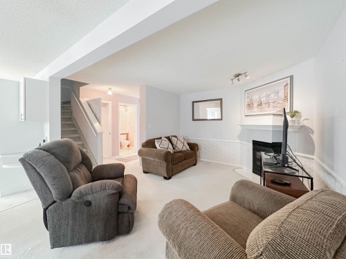 3 10 Devon Close, St. Albert, AB - Indoor Photo Showing Living Room With Fireplace