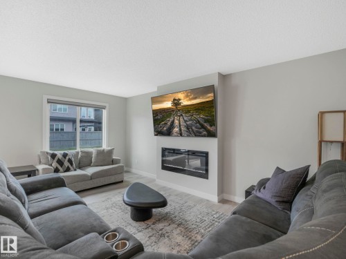 7808 174 Avenue, Edmonton, AB - Indoor Photo Showing Living Room With Fireplace