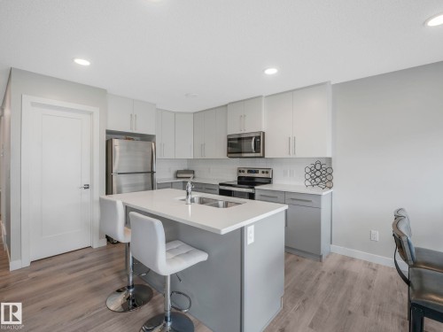 7808 174 Avenue, Edmonton, AB - Indoor Photo Showing Kitchen With Double Sink
