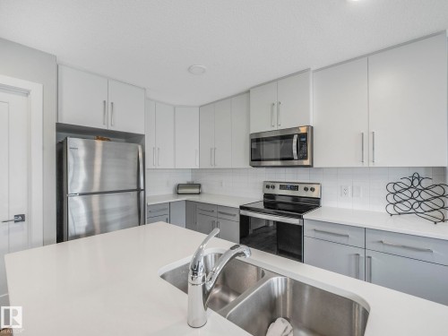 7808 174 Avenue, Edmonton, AB - Indoor Photo Showing Kitchen With Double Sink With Upgraded Kitchen
