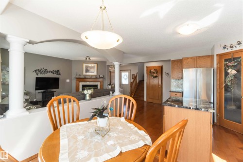 Open-concept living space featuring wood-finish flooring - 17224 83 Street, Edmonton, AB - Indoor Photo Showing Dining Room